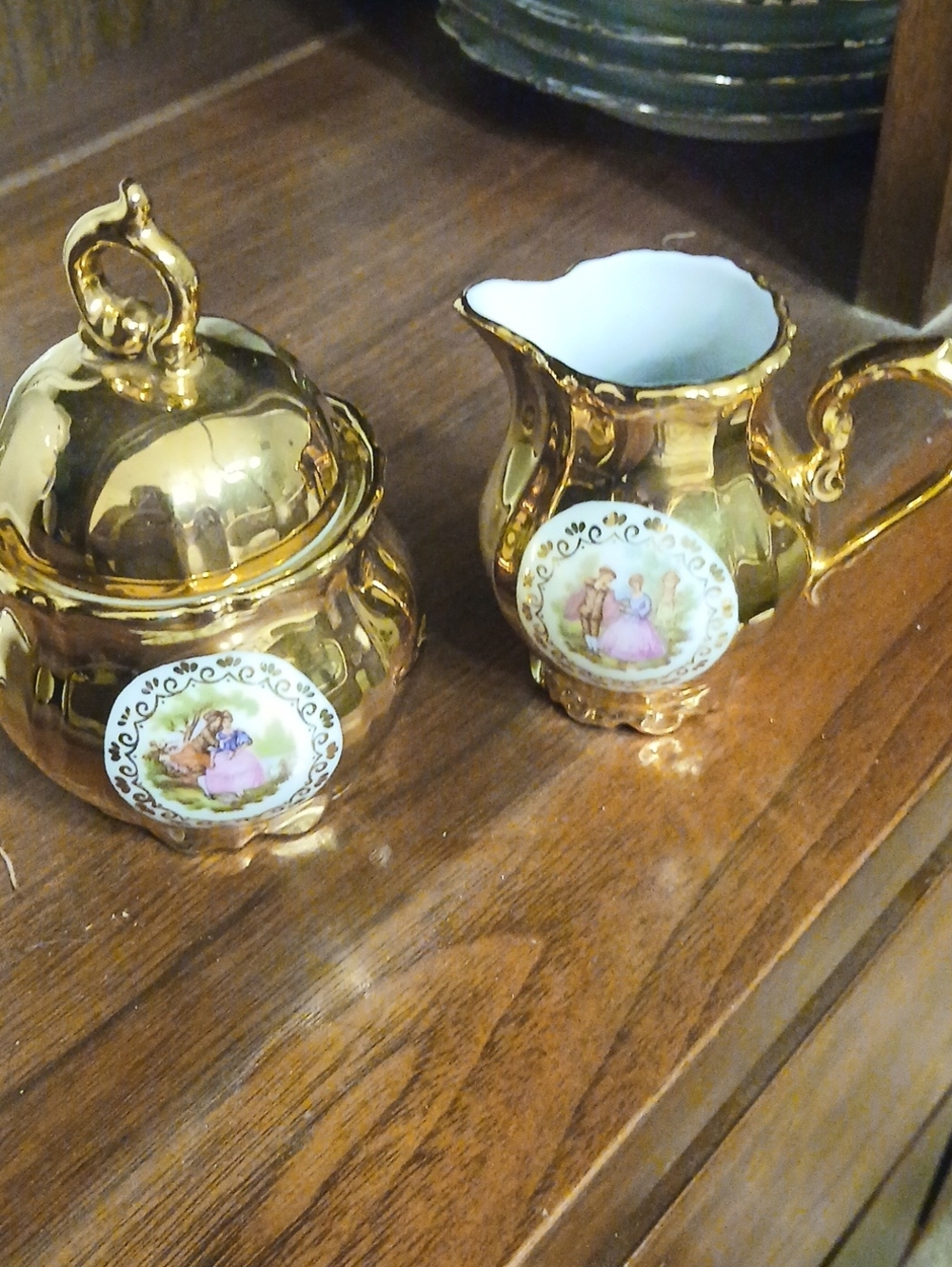 Gold Porcelain Creamer and Sugar Set with Decorative Medallions